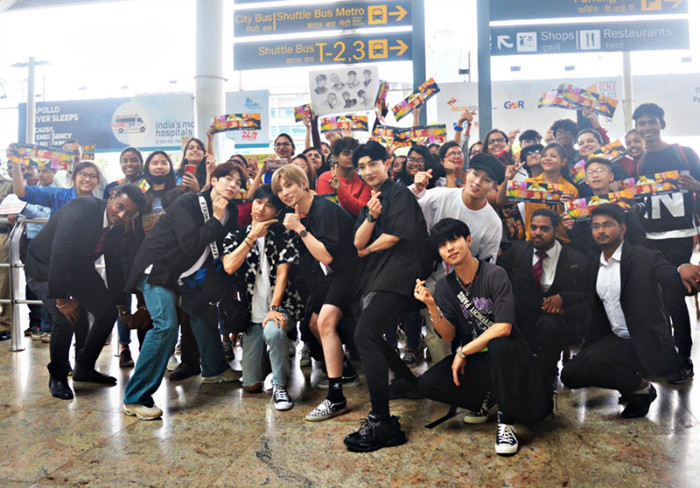 K-pop enthusiasts in April surprise In2it with fan art and letters at the Chhatrapati Shivaji International Airport in Mumbai.